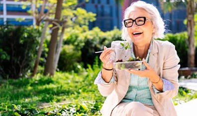 Lady enjoys salad