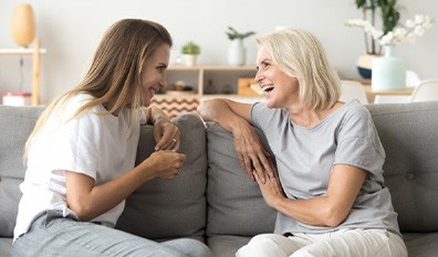 Ladies converse on couch