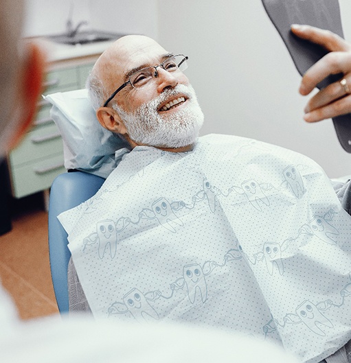 Man smiling in dental chair