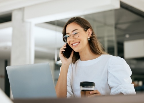 Man checking in at dental office reception desk