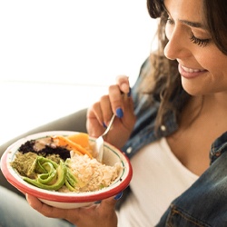 young woman eating healthy food