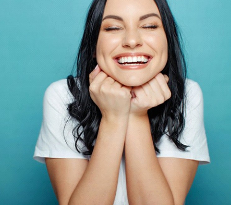 woman with veneers in Goodyear smiling