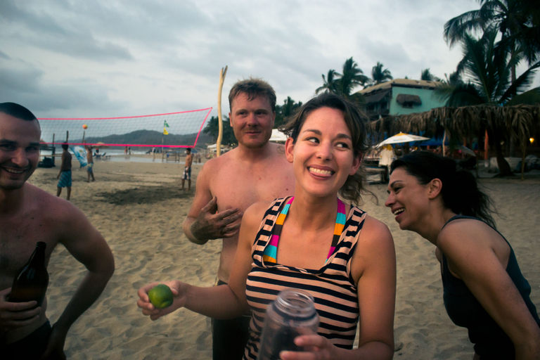 person on summer vacation smiling on a beach