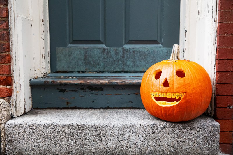 Smiling pumpkin with braces.